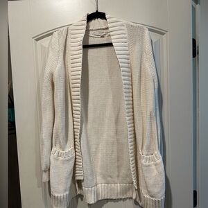 White cardigan.